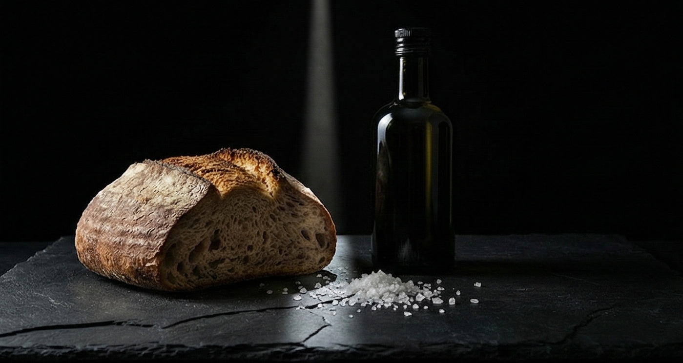 Pan artesanal y aceite oscuro